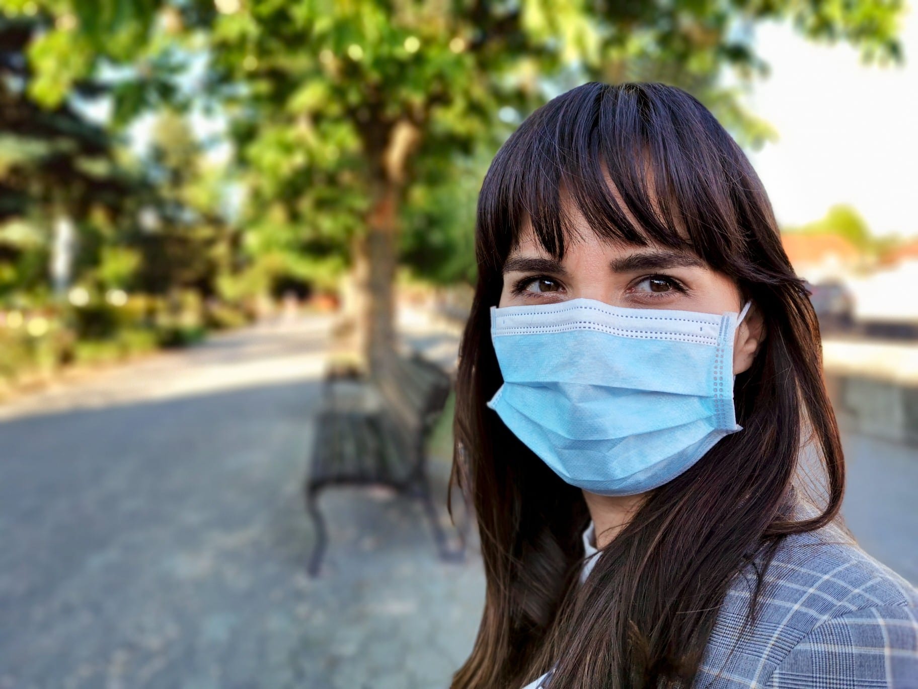 young-woman-in-city-wearing-protective-face-mask-virus-covid-19-corona-virus-one-person-portrait_t20_YEg6KX